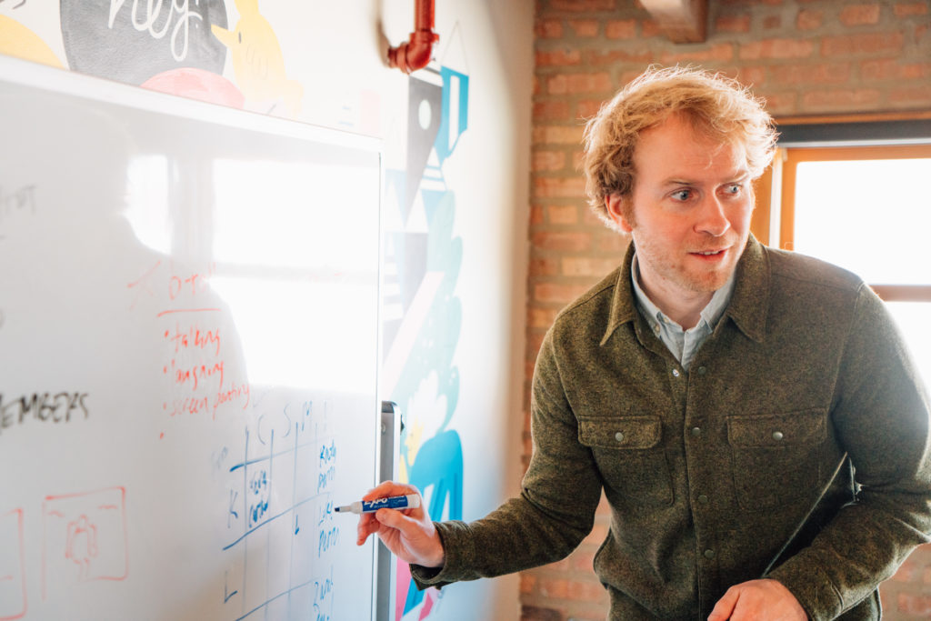Jarrett Corporate Video Production Company a pic of someone brainstorming at a corporate video production company