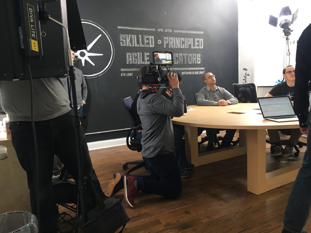 behind the scenes with a chicago video production company filming a testimonial