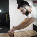 Photo of a team member setting up objects for a stop motion animation production