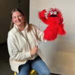 Marissa chicago video production producer holding a puppet